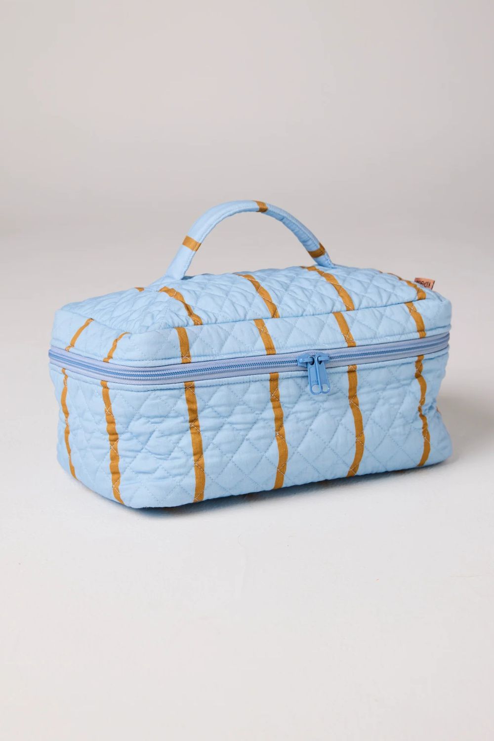 COMO STRIPE QUILTED COTTON TOILETRY CASE